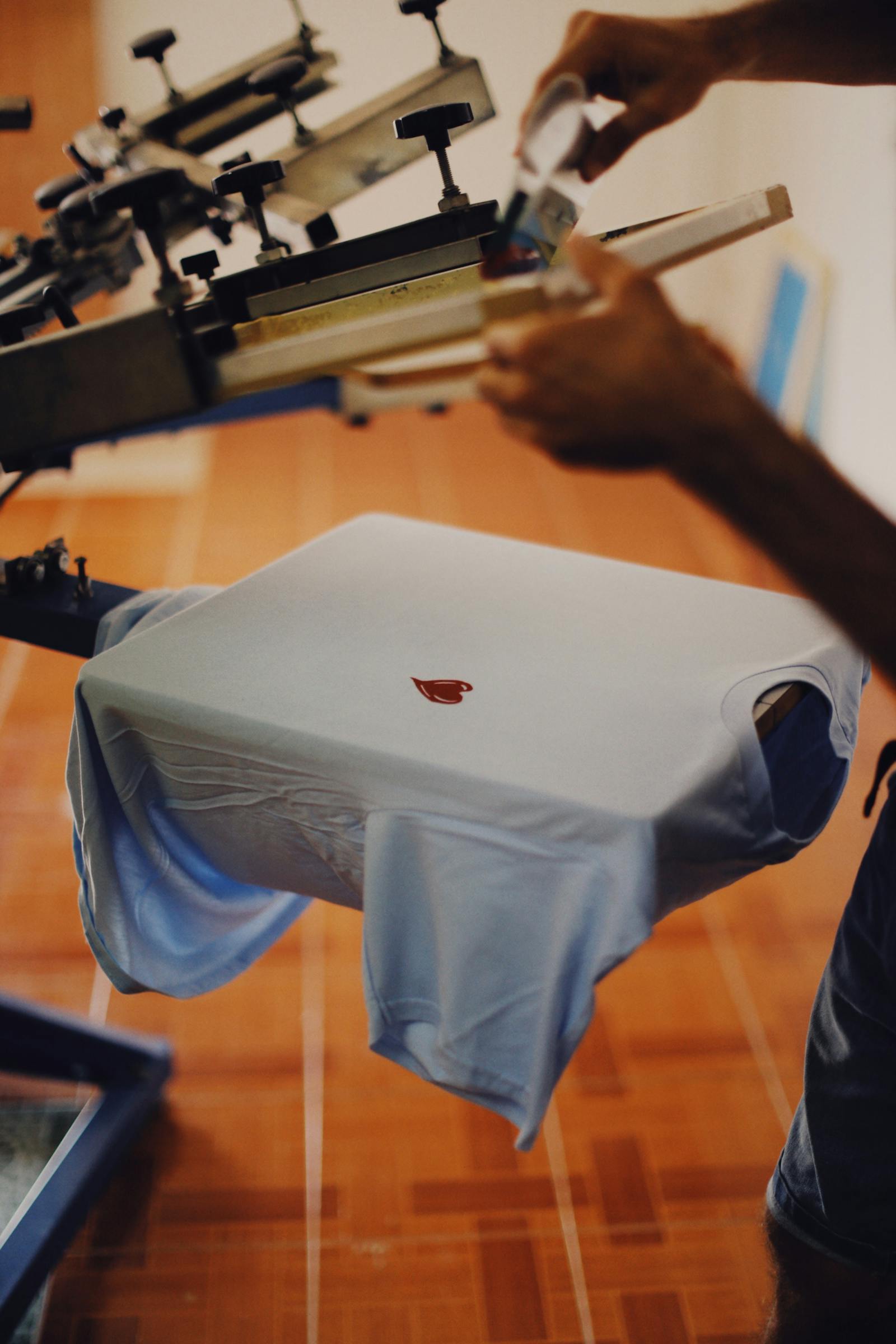 Screen printing a custom design onto a shirt